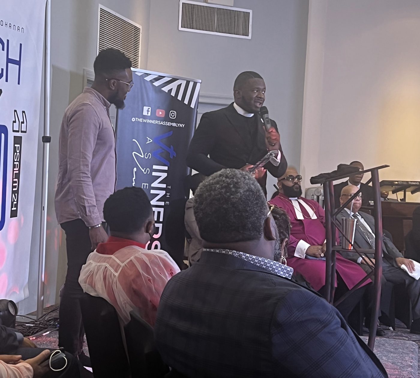 Pastor Jahleel Spence being honored by Pastor Vincent Bohanan and The Winners' Assembly